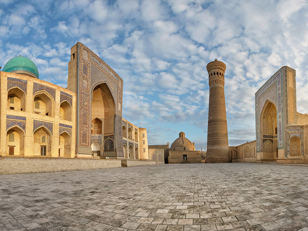 Panoramic view of Poi Kalan - an islamic religious complex located around the Kalan minaret in Bukhara, Uzbekistan